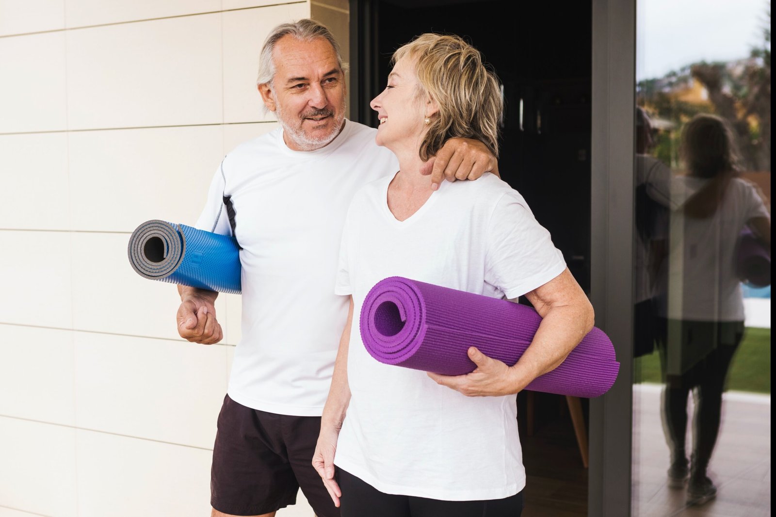 senior couple over 50 exercising